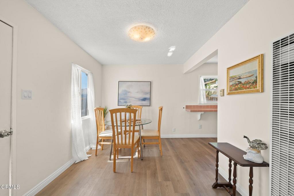 4025 Maxson Road El Monte, CA 91732 - Photo 7 of 27 a view of a livingroom with furniture and wooden floor