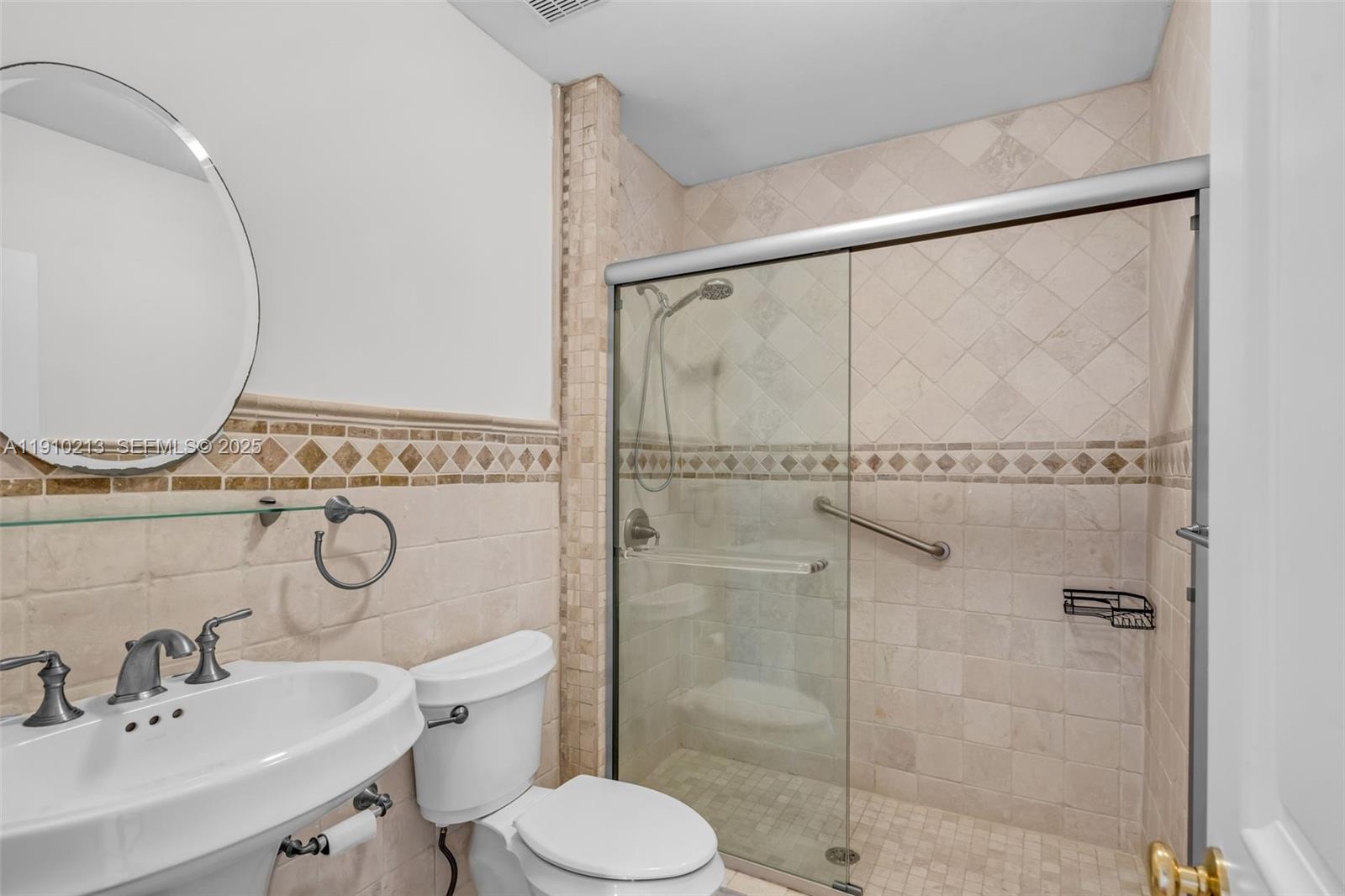4416 Southwest 14th Street Miami, FL 33134 - Photo 21 of 33 a bathroom with a toilet sink and shower