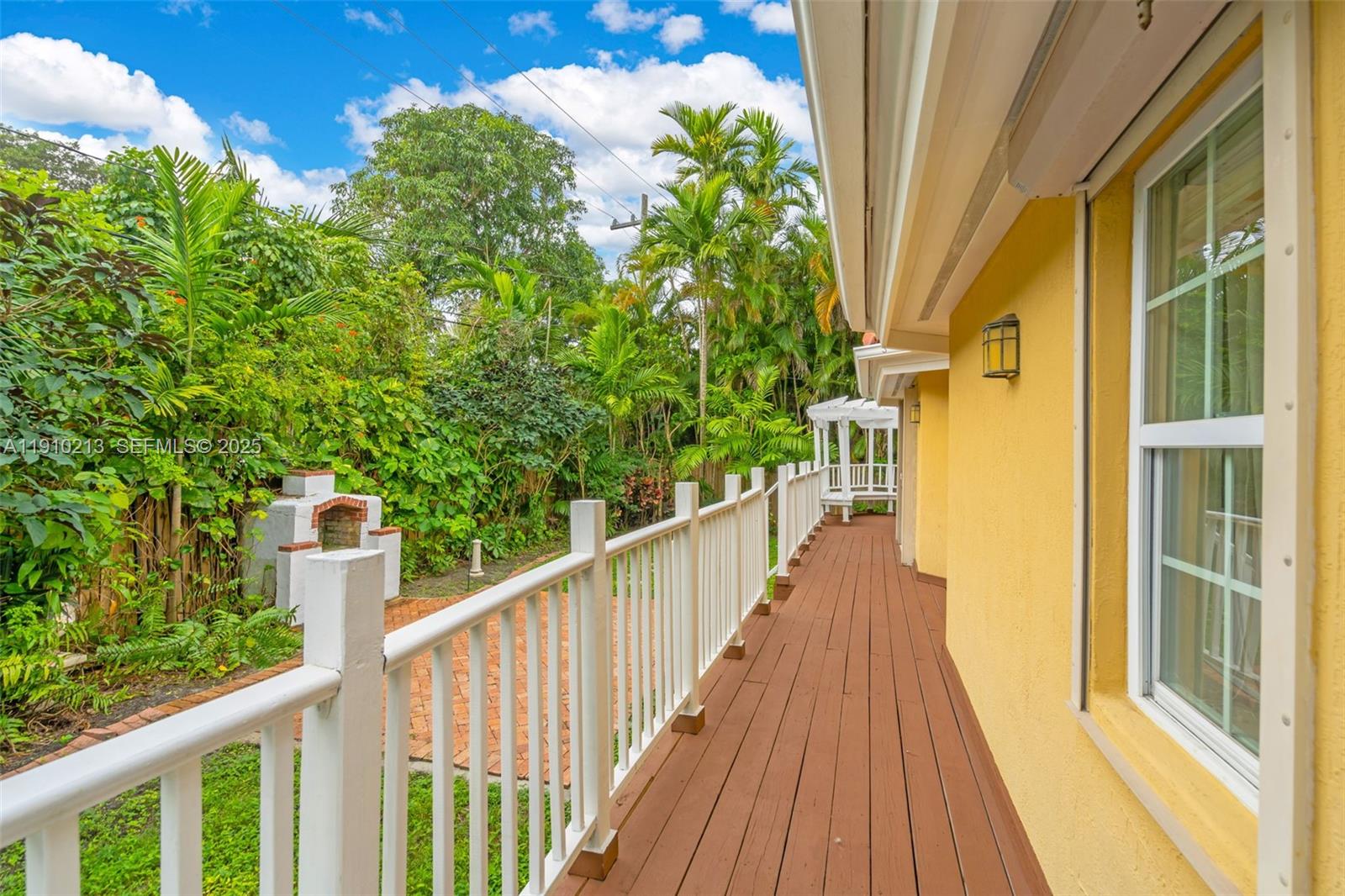 4416 Southwest 14th Street Miami, FL 33134 - Photo 26 of 33 a view of a balcony with wooden floor