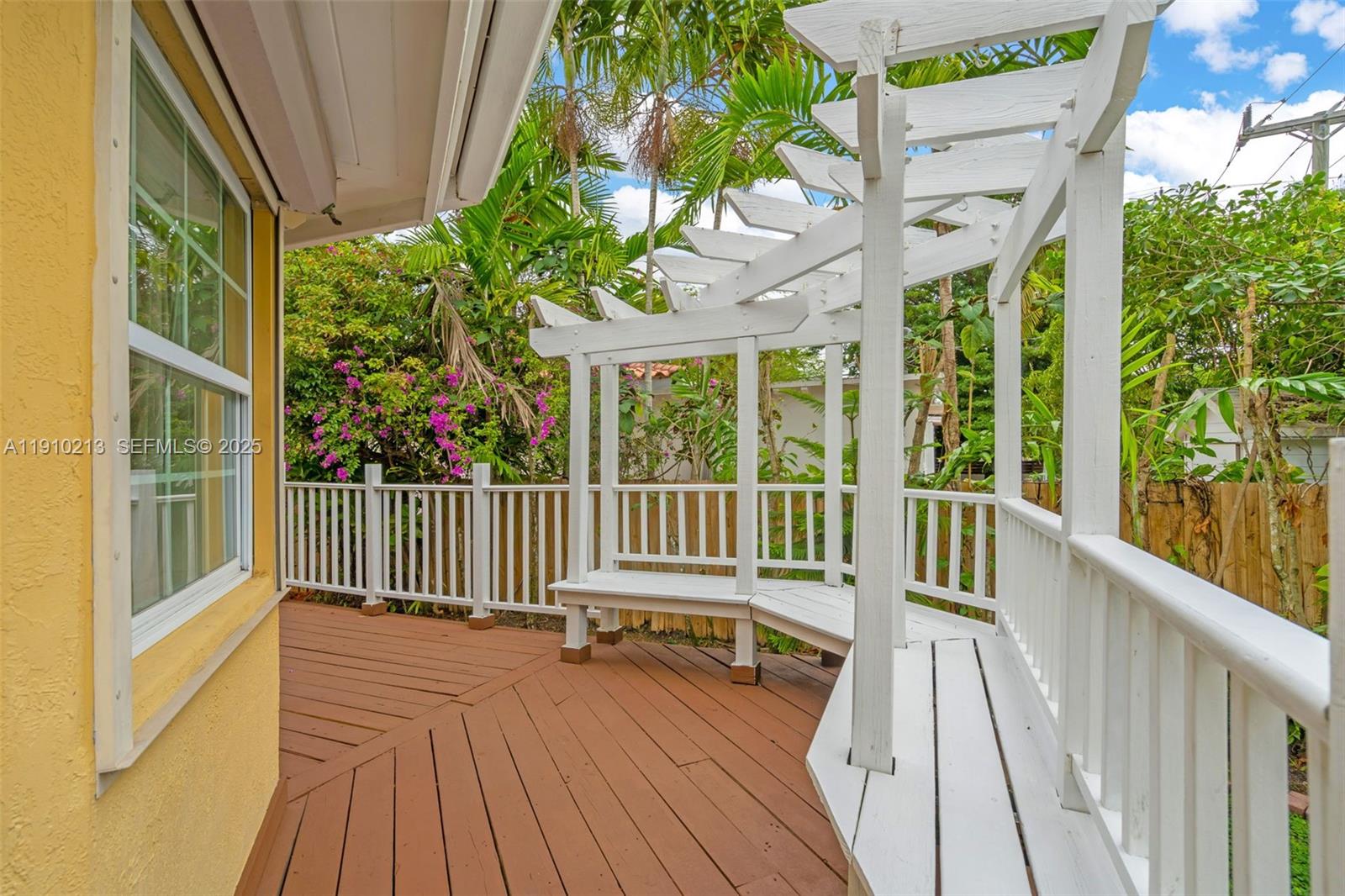 4416 Southwest 14th Street Miami, FL 33134 - Photo 27 of 33 a view of a balcony with wooden floor