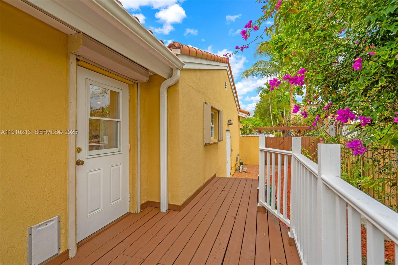 4416 Southwest 14th Street Miami, FL 33134 - Photo 28 of 33 a view of a house and wooden deck
