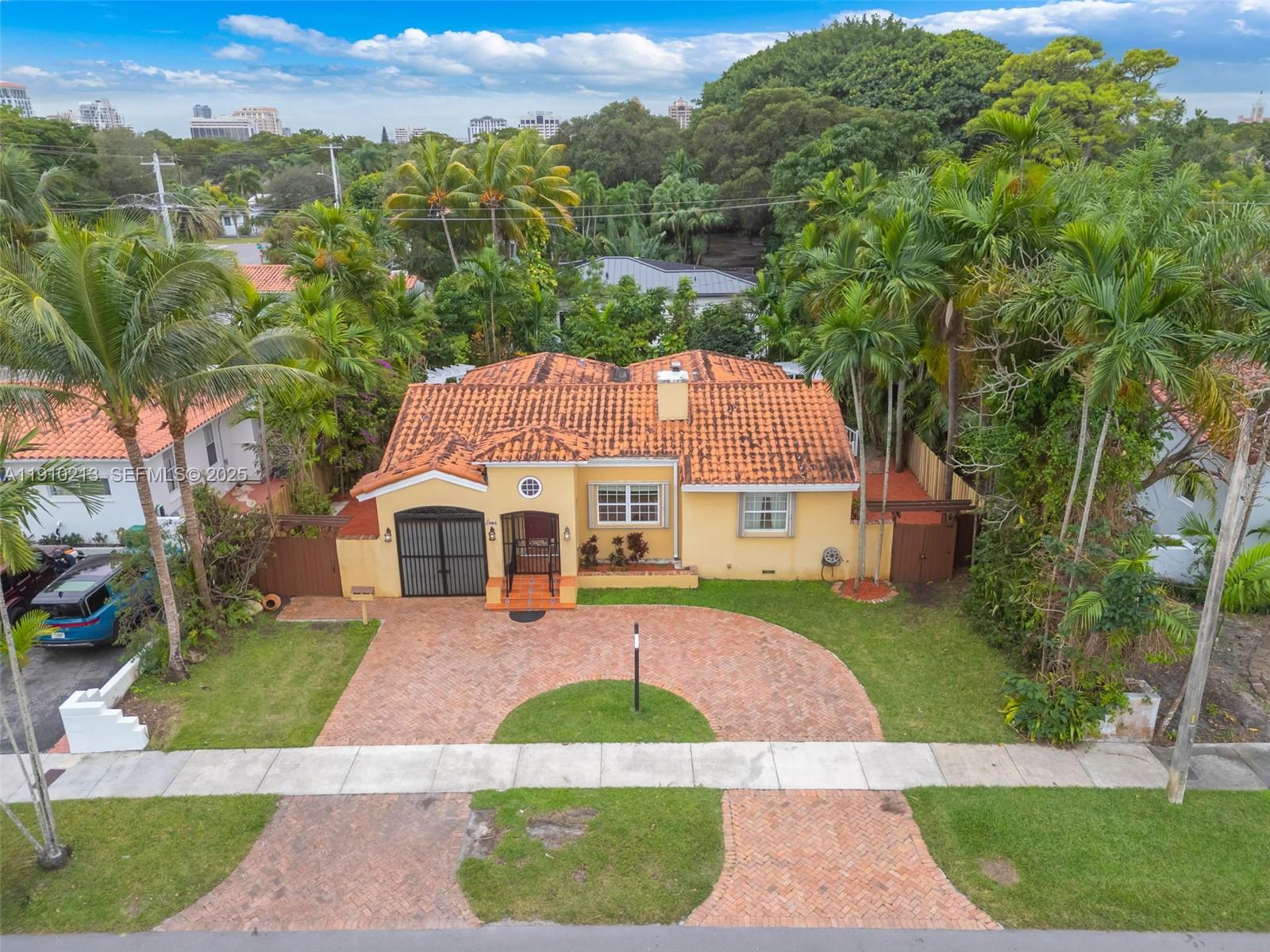 4416 Southwest 14th Street Miami, FL 33134 - Photo 31 of 33 a front view of a house with a yard