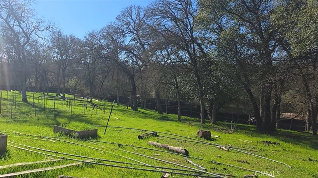123 Railbridge Road Oroville, CA 95966 - Photo 12 of 22 a view of a tennis ground with a small pool
