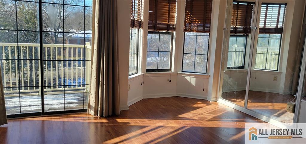 83 Crosspointe Drive, Unit 83 East Brunswick, NJ 08816 - Photo 3 of 11 a view of a balcony