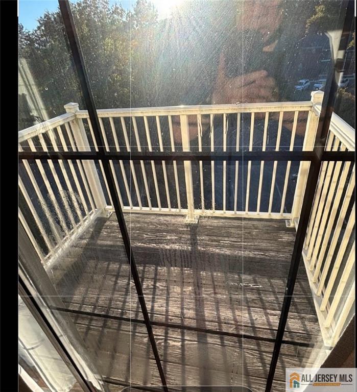 83 Crosspointe Drive, Unit 83 East Brunswick, NJ 08816 - Photo 9 of 11 a view of a balcony