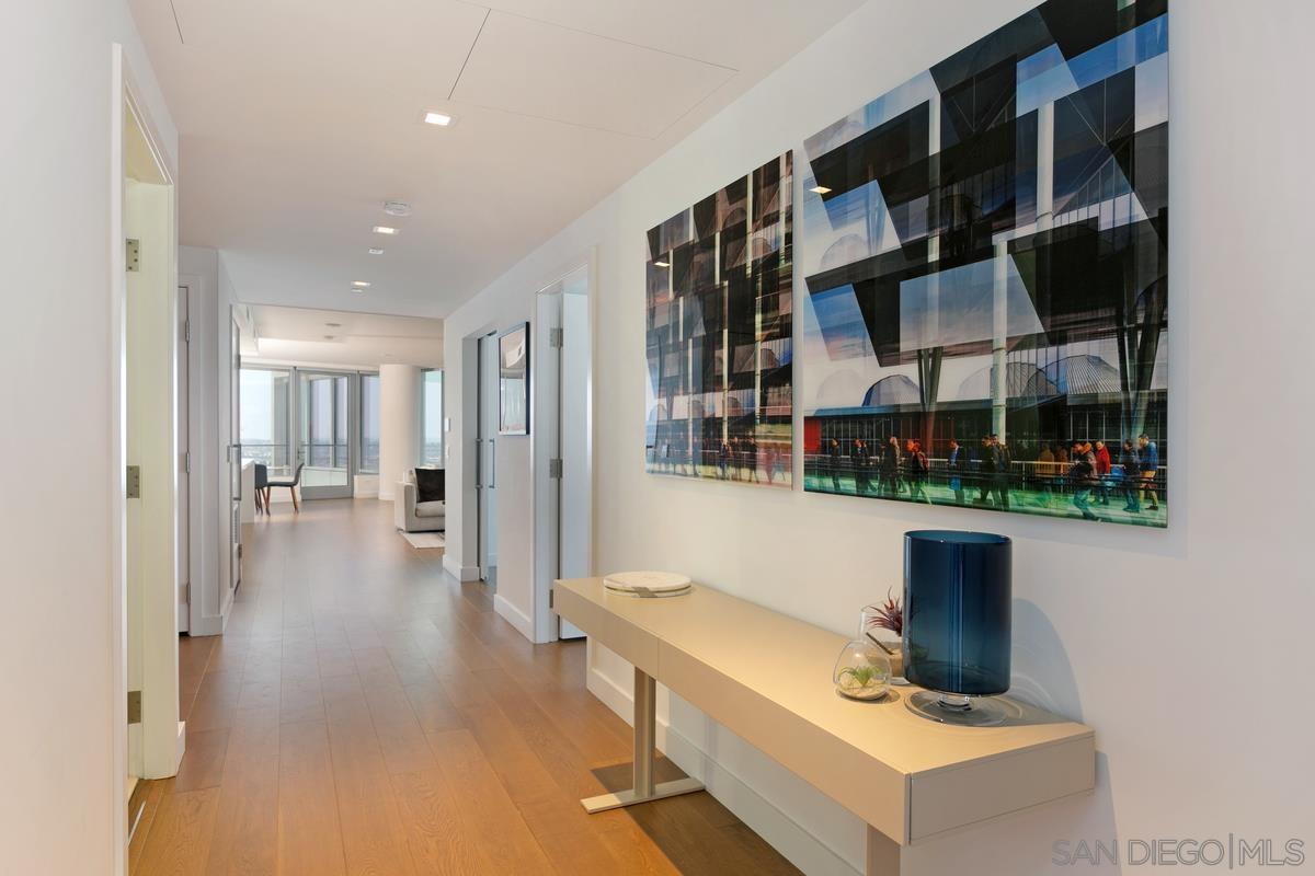 888 E Street, Unit 3501 San Diego, CA 92101 - Photo 21 of 46 a living room with furniture and a fireplace