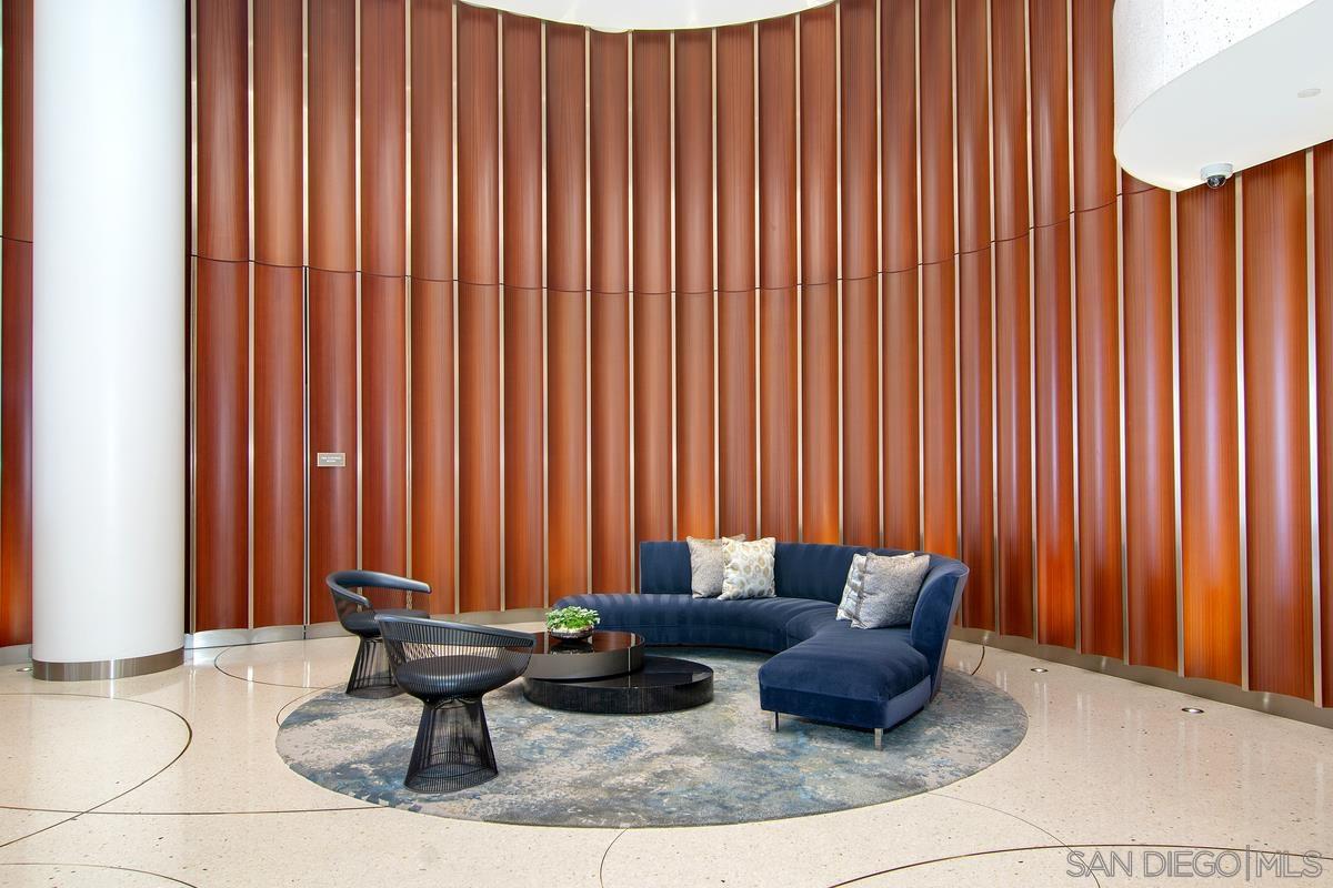 888 E Street, Unit 3501 San Diego, CA 92101 - Photo 36 of 46 a living room with furniture and a curtain