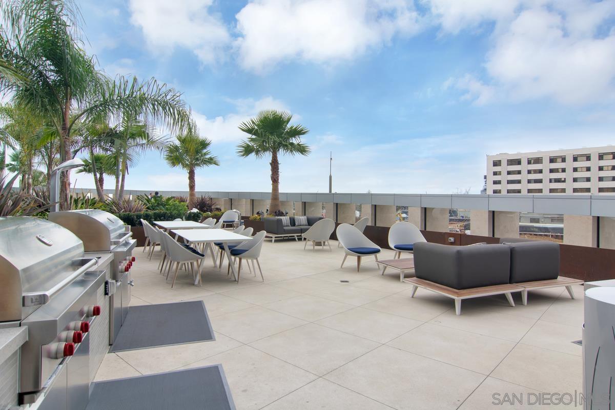 888 E Street, Unit 3501 San Diego, CA 92101 - Photo 40 of 46 a view of a patio with swimming pool and sitting area