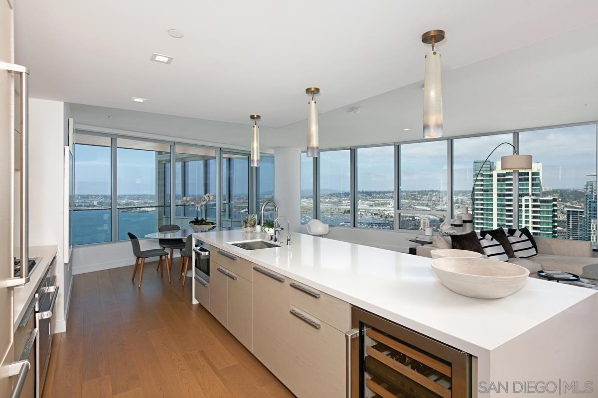 888 E Street, Unit 3501 San Diego, CA 92101 - Photo 7 of 46 a large kitchen with kitchen island a large window in it