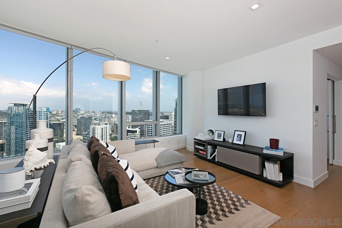 888 E Street, Unit 3501 San Diego, CA 92101 - Photo 10 of 46 a living room with furniture and a flat screen tv