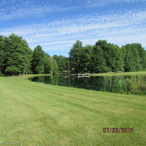 2241 Porter Road Atwater, OH 44201 - Photo 3 of 25 Swim from the dock, fish, paddle boat. Tranquility and beauty.