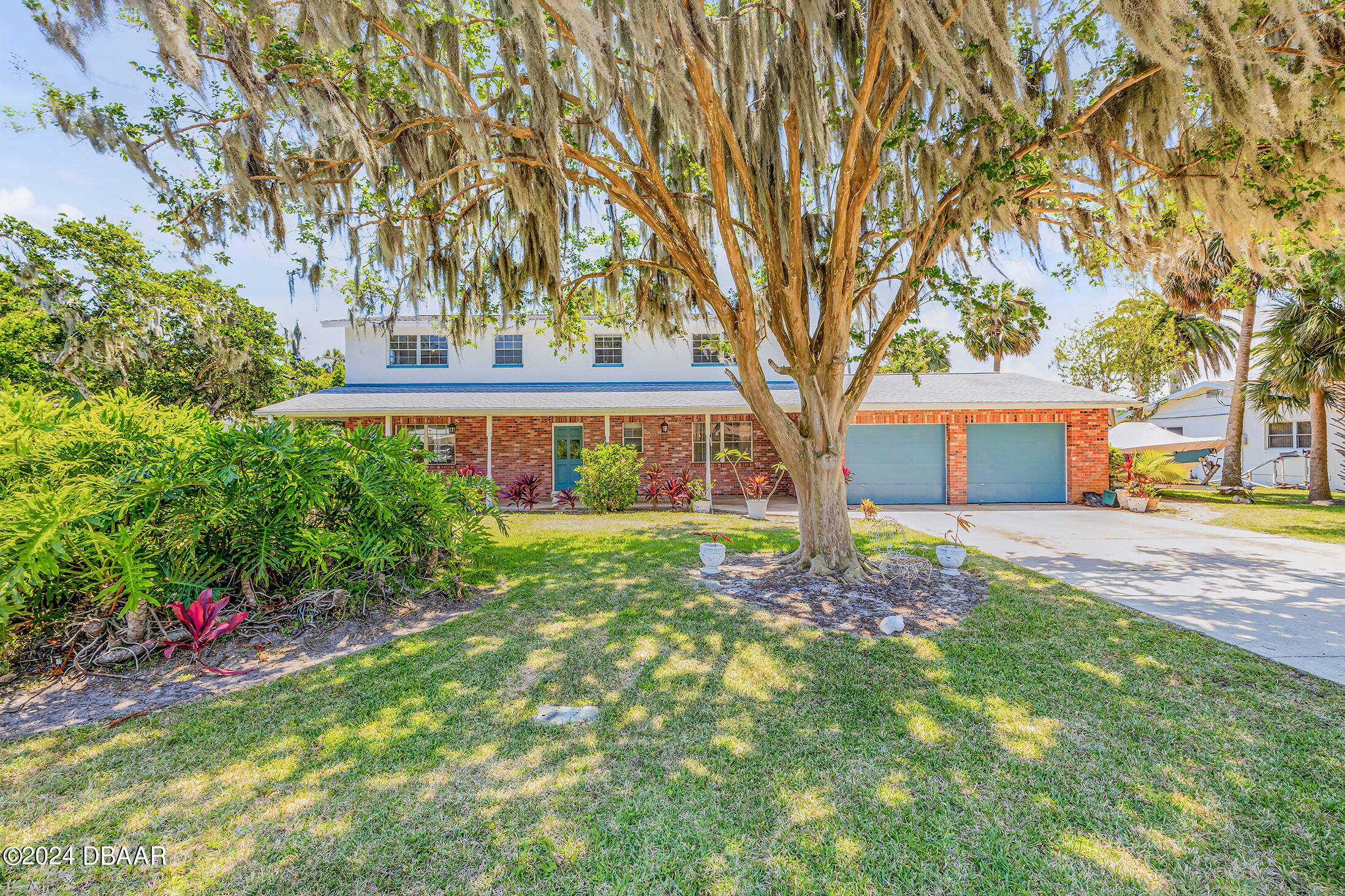 909 Pineapple Road South Daytona, FL 32119 - Photo 1 of 68 Front Yard 1.2