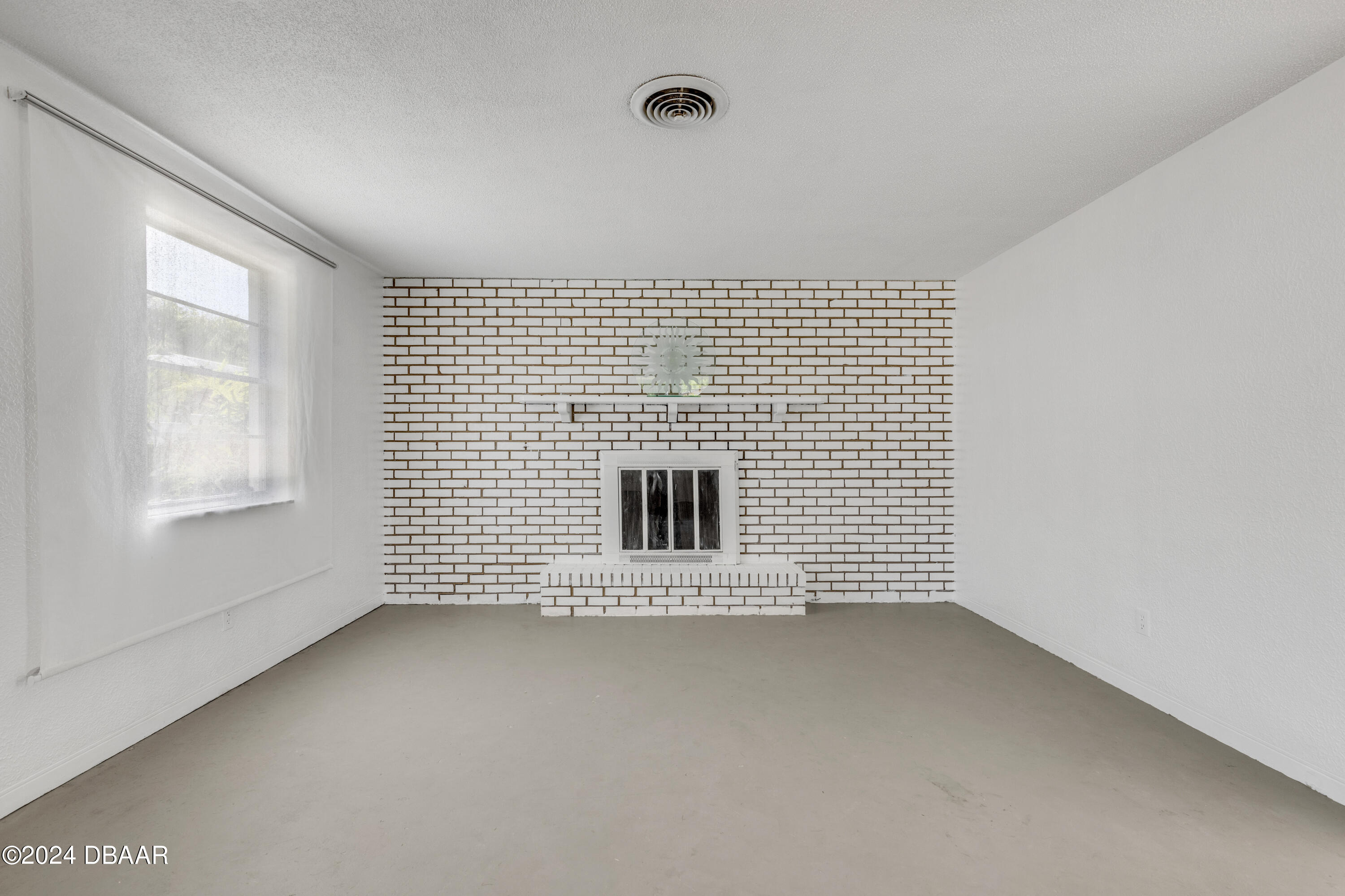 909 Pineapple Road South Daytona, FL 32119 - Photo 16 of 68 Living Room Fireplace