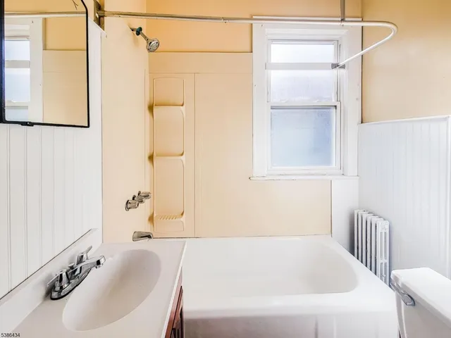 a bathroom with a sink and a bathtub