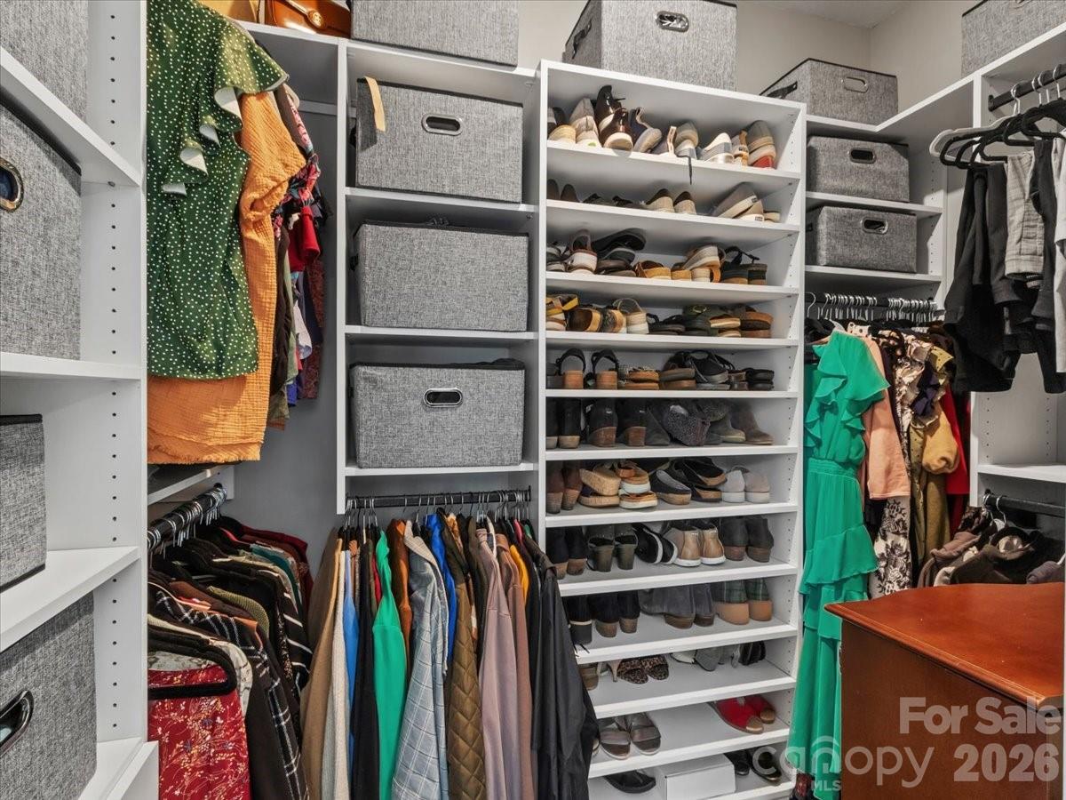 36 Cherry Ridge Lane Weaverville, NC 28787 - Photo 19 of 37 a view of walk in closet with clothes and shoes