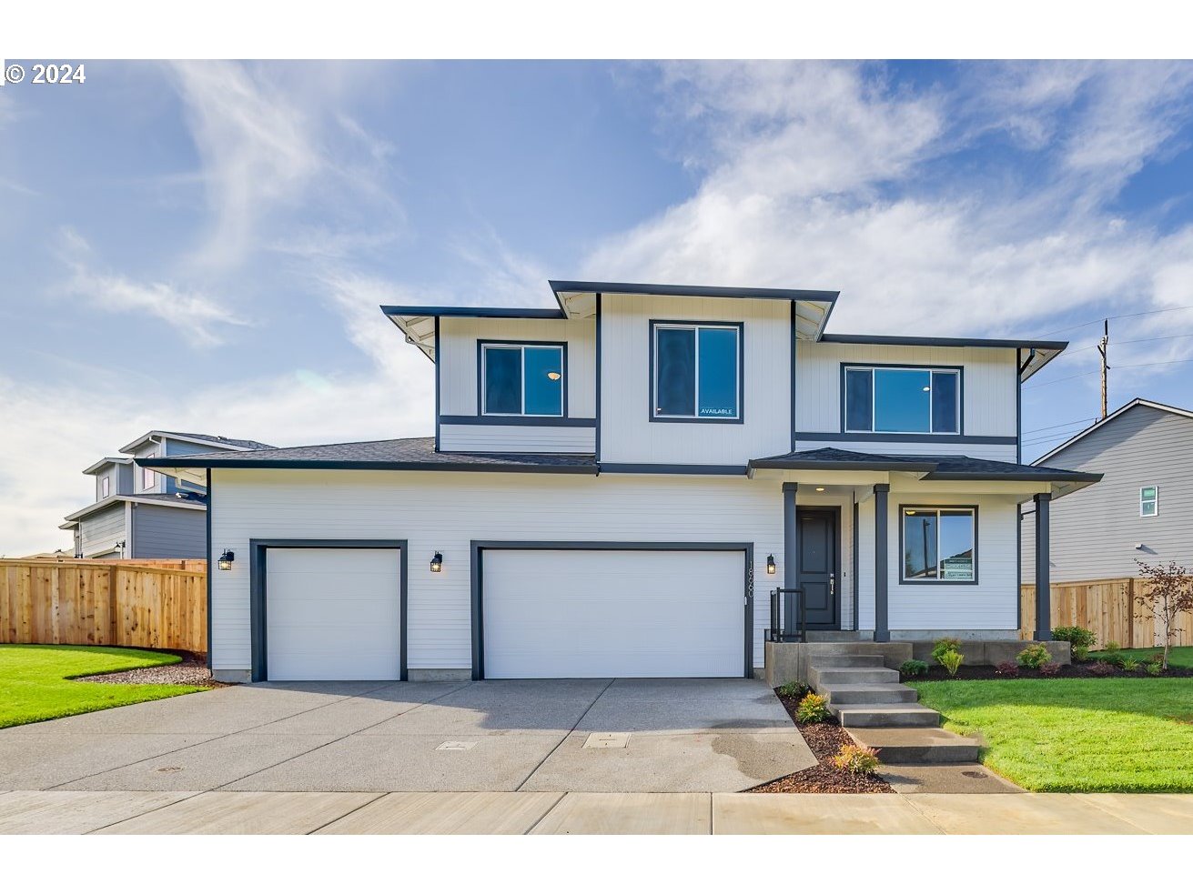 18660 Warm Springs Street, Unit 10 Sandy, OR 97055 - Photo 1 of 42 a front view of a house with a yard and garage