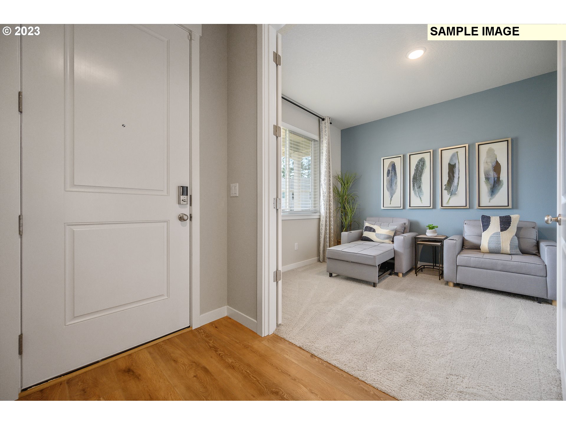 18660 Warm Springs Street, Unit 10 Sandy, OR 97055 - Photo 12 of 42 a bedroom with furniture and a couch