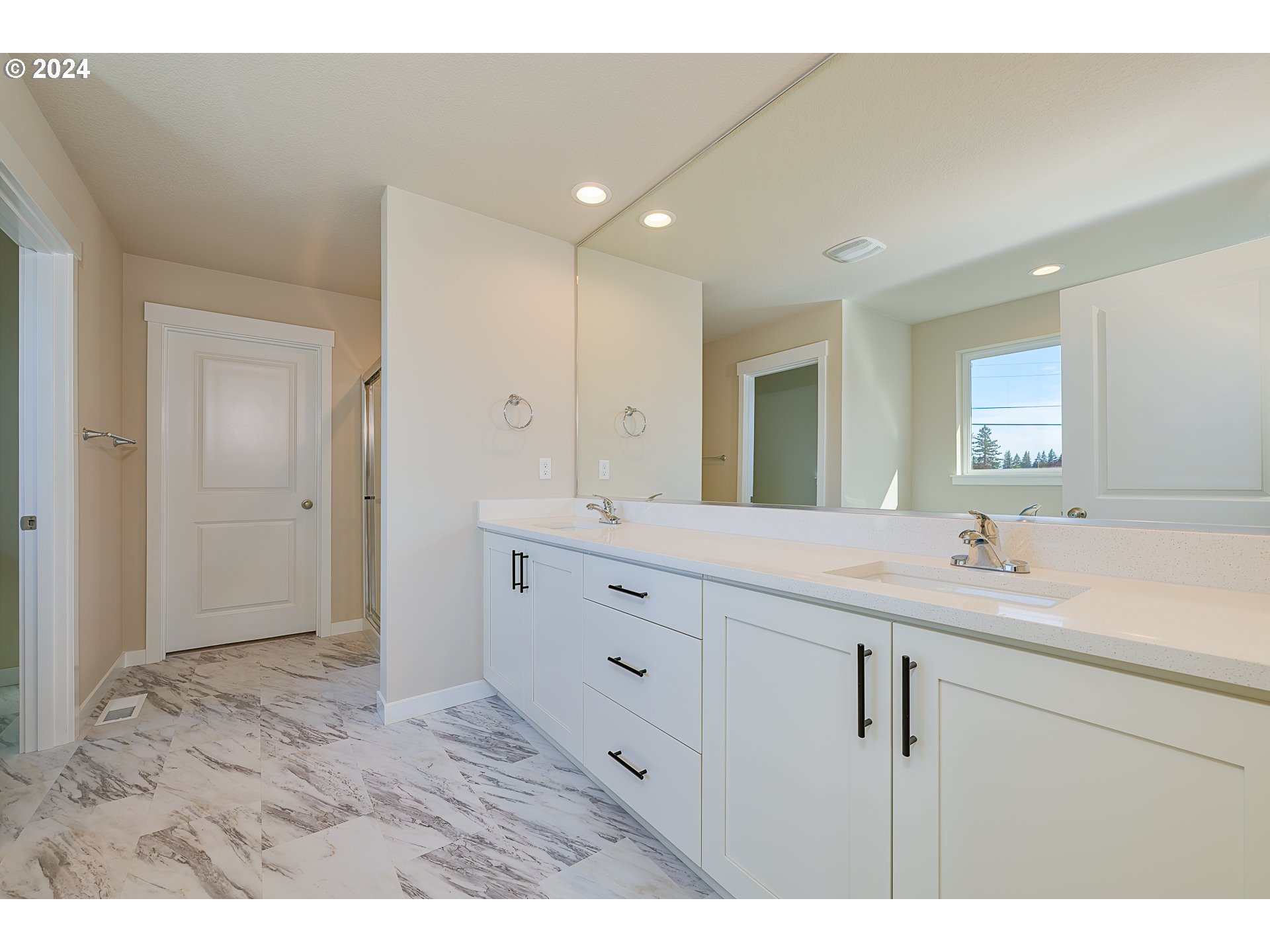 18660 Warm Springs Street, Unit 10 Sandy, OR 97055 - Photo 24 of 42 a bathroom with a sink a mirror and a vanity