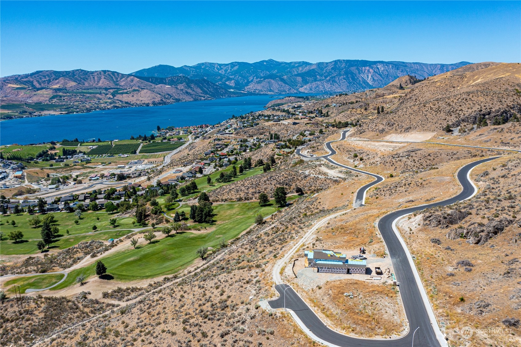 929 Long Drive Chelan, WA 98816 - Photo 13 of 23 a view of a backyard with wooden floor and mountain view