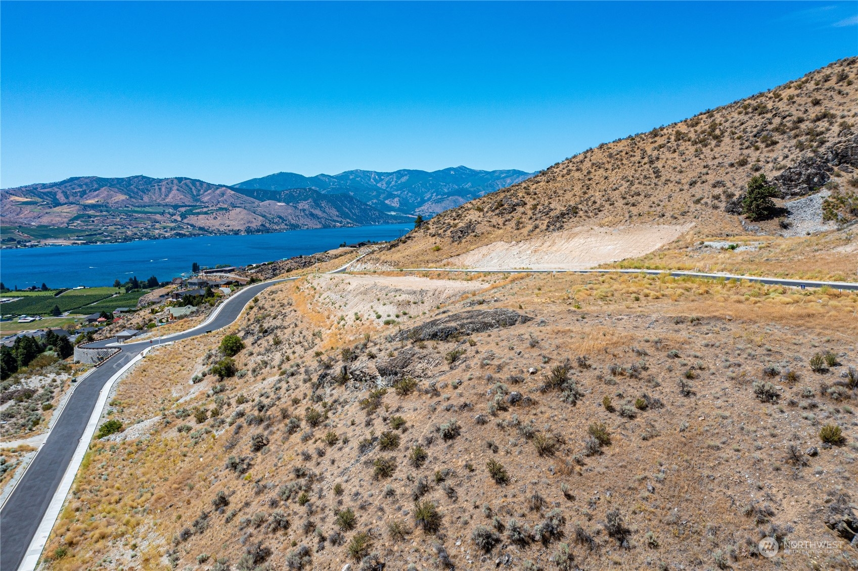 929 Long Drive Chelan, WA 98816 - Photo 19 of 23 a view of a large body of water and mountain