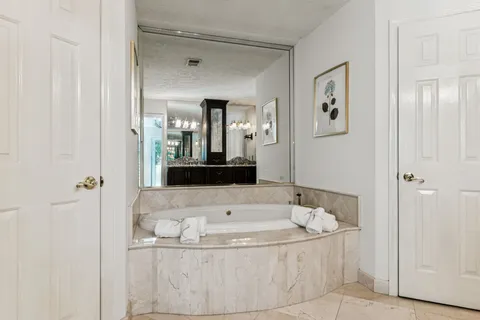 a view of a balcony with chairs