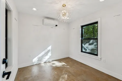 a view of a hallway with closet