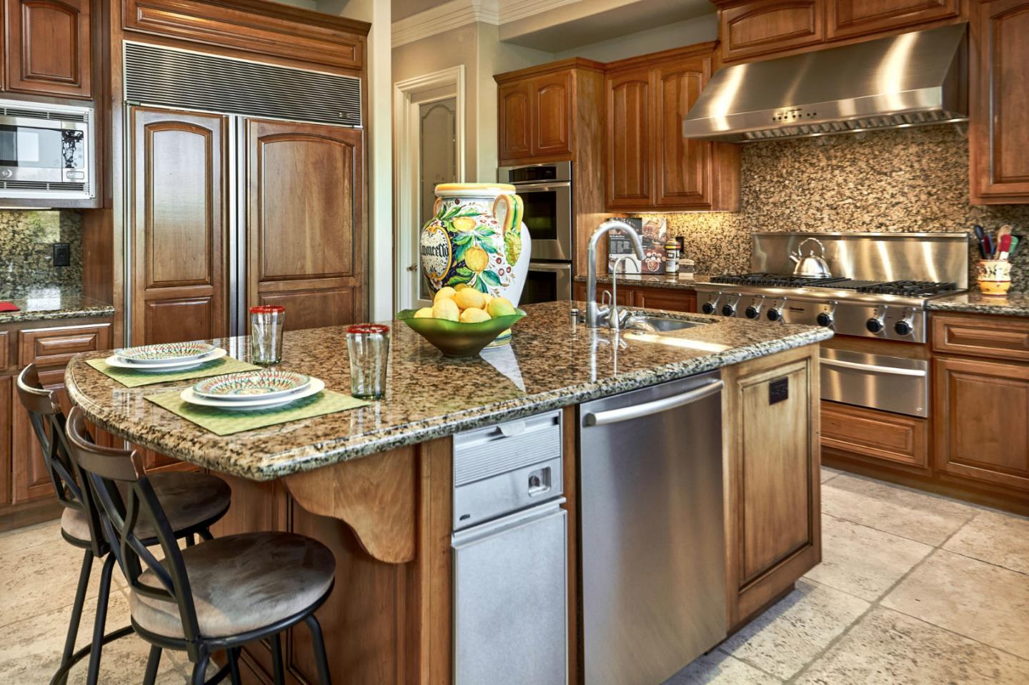 13800 Watsonville Road Morgan Hill, CA 95037 - Photo 19 of 74 a kitchen with stainless steel appliances granite countertop a stove a sink and a refrigerator