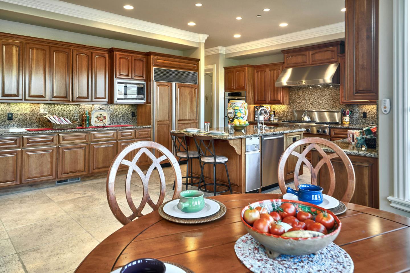 13800 Watsonville Road Morgan Hill, CA 95037 - Photo 20 of 74 a kitchen with a table and chairs in it