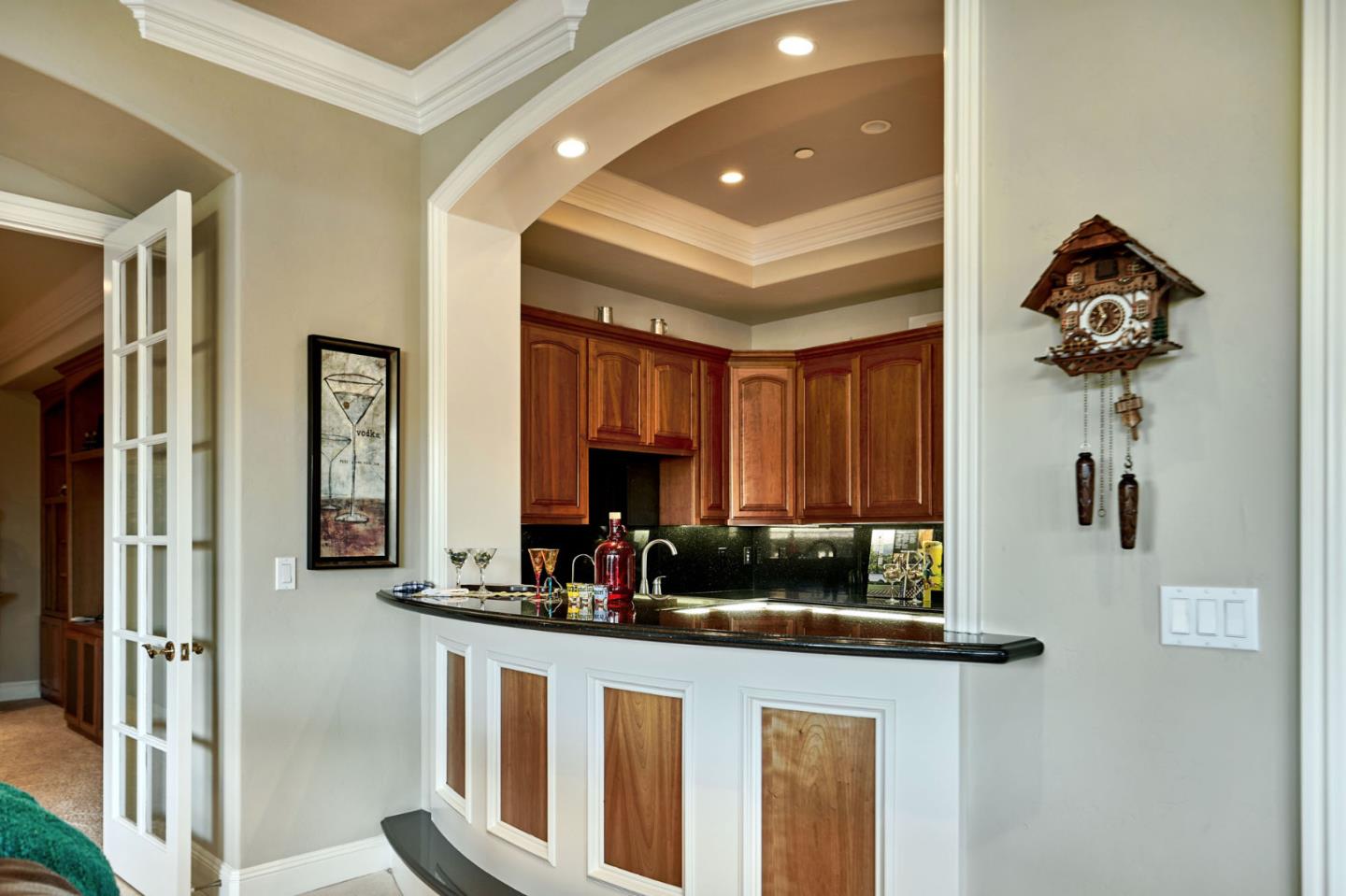 13800 Watsonville Road Morgan Hill, CA 95037 - Photo 26 of 74 a view of a hallway with a kitchen and a window