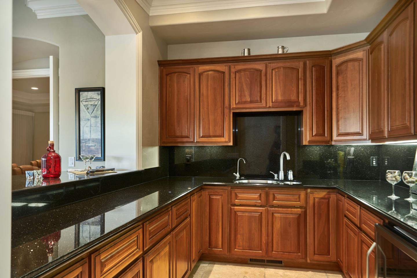 13800 Watsonville Road Morgan Hill, CA 95037 - Photo 28 of 74 a kitchen with stainless steel appliances granite countertop a sink dishwasher cabinets and granite countertops with wooden floor