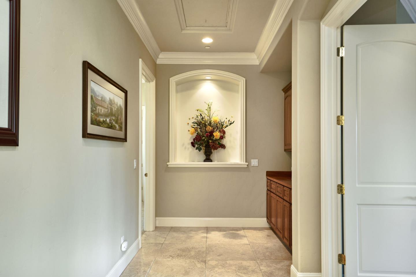 13800 Watsonville Road Morgan Hill, CA 95037 - Photo 34 of 74 a view of a hallway with wooden floor and windows