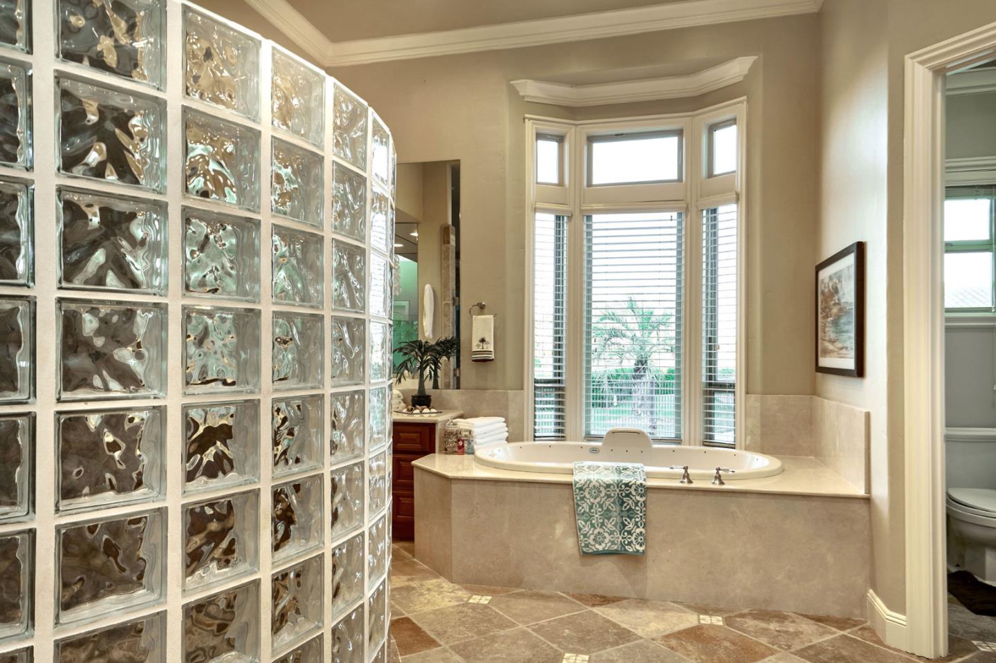 13800 Watsonville Road Morgan Hill, CA 95037 - Photo 40 of 74 a bathroom with a bathtub and window