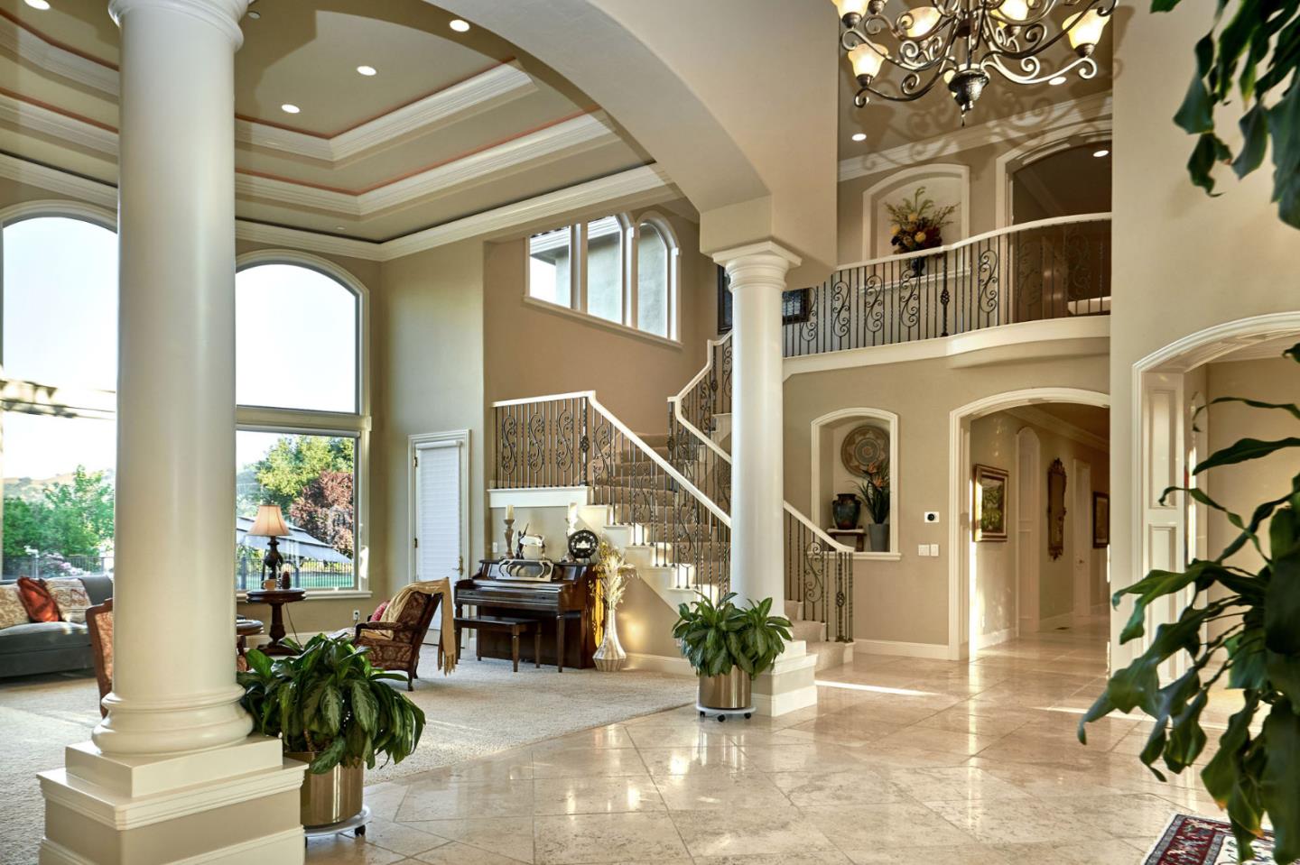 13800 Watsonville Road Morgan Hill, CA 95037 - Photo 45 of 74 a vase of flowers sitting on a floor in front of a house