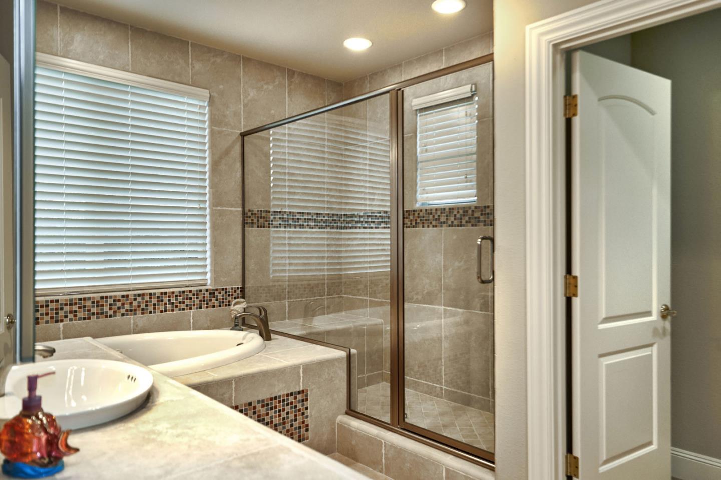 13800 Watsonville Road Morgan Hill, CA 95037 - Photo 71 of 74 a bathroom with a tub and a sink