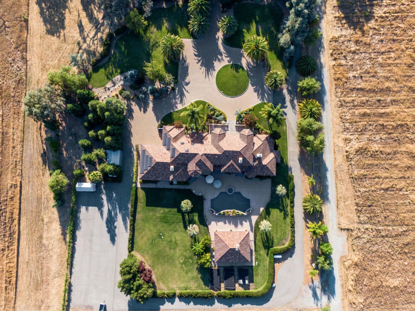 13800 Watsonville Road Morgan Hill, CA 95037 - Photo 73 of 74 an aerial view of a house with a yard and large trees