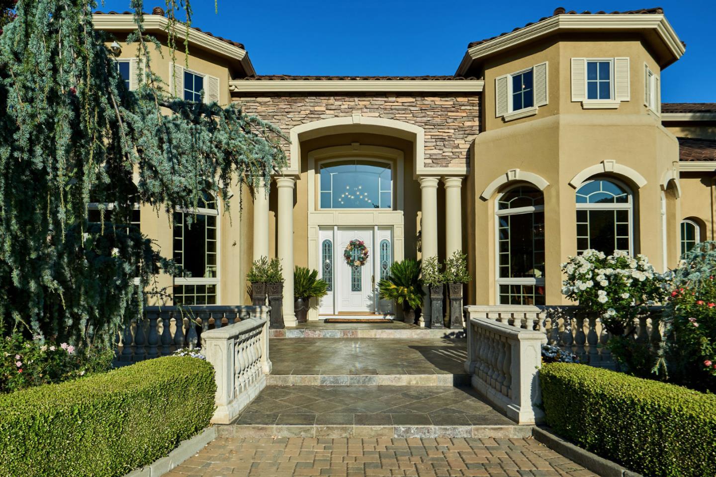 13800 Watsonville Road Morgan Hill, CA 95037 - Photo 8 of 74 a front view of a house with a garden