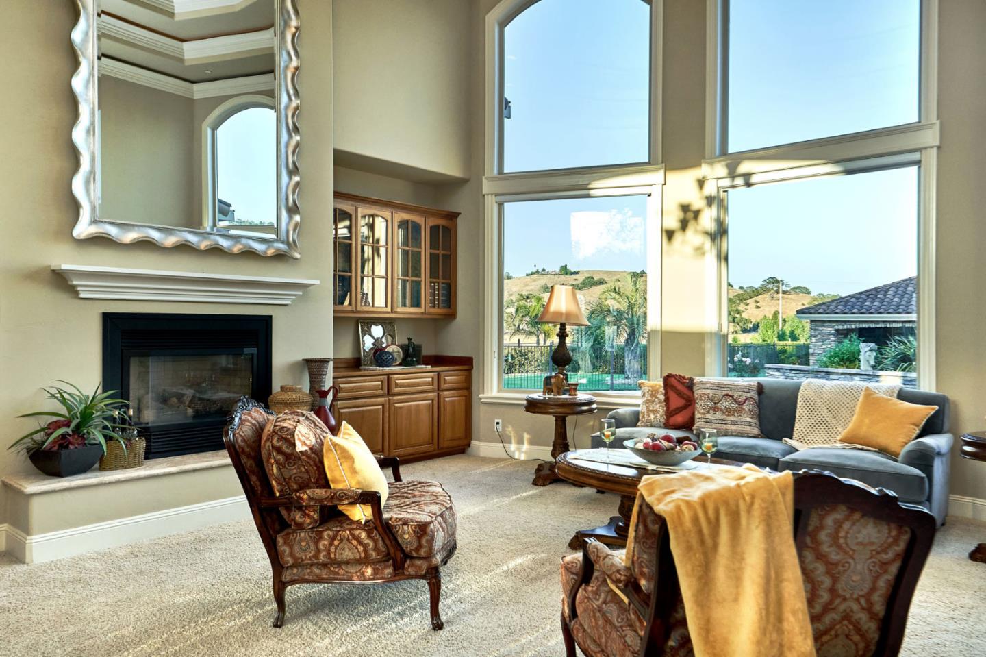 13800 Watsonville Road Morgan Hill, CA 95037 - Photo 10 of 74 a living room with furniture and a fireplace