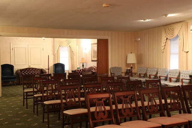 a view of a dining table and chairs