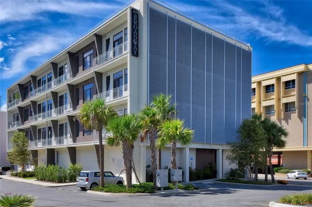 a front view of residential houses with street