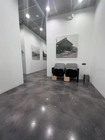 a view of a livingroom with furniture