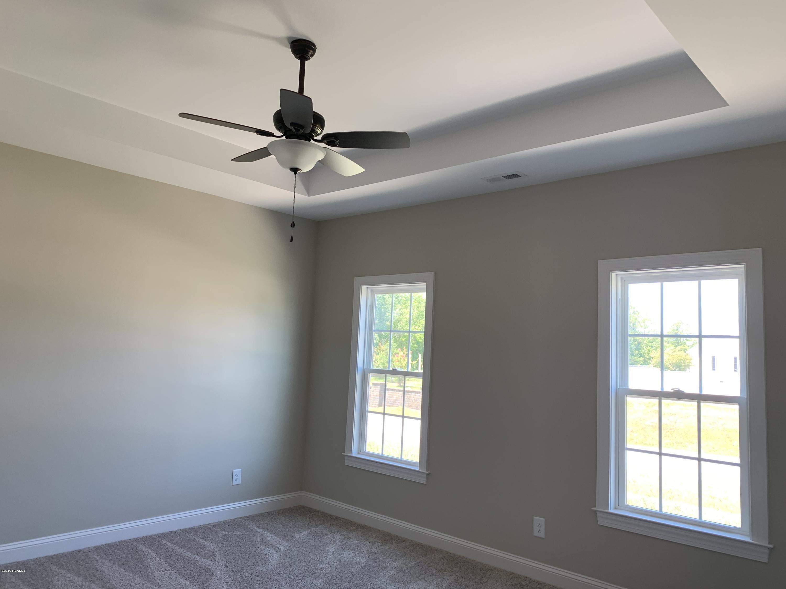 201 Echo Ridge Road Swansboro, NC 28584 - Photo 49 of 63 Tray Ceilings in Master Bedroom