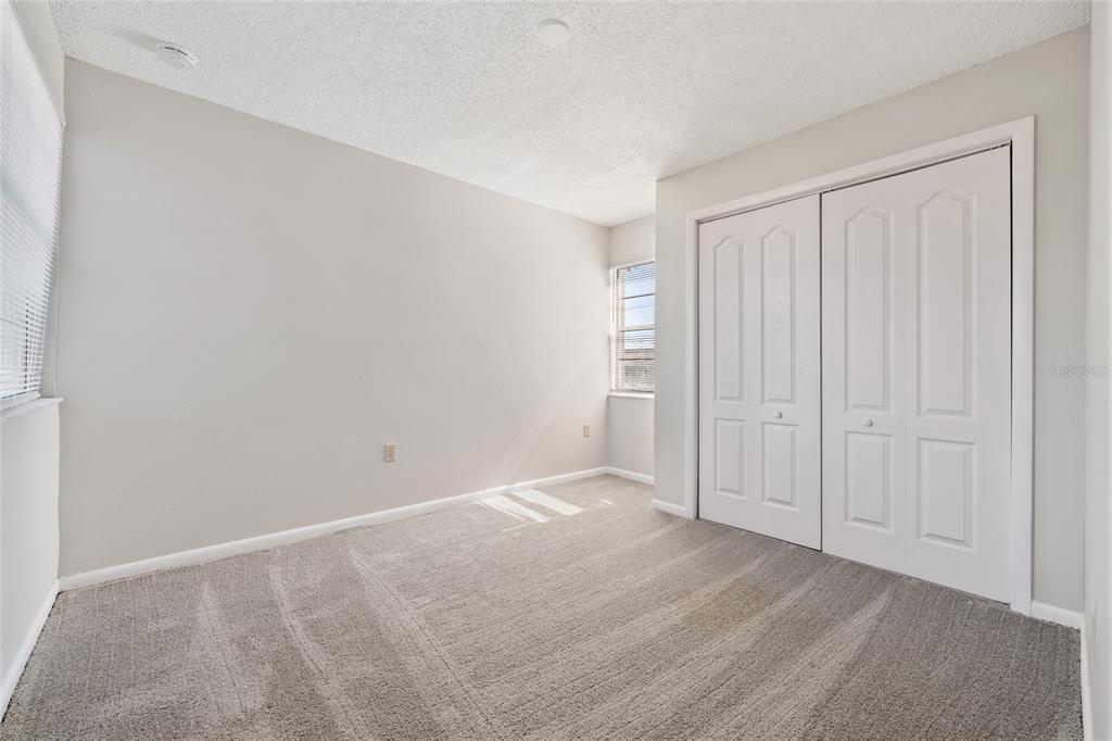 2025 Sylvester Road, Unit N312 Lakeland, FL 33803 - Photo 21 of 35 a view of an empty room and wooden floor