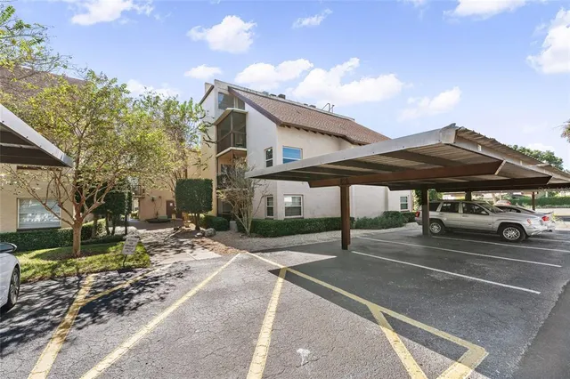 a view of a house with patio area and porch