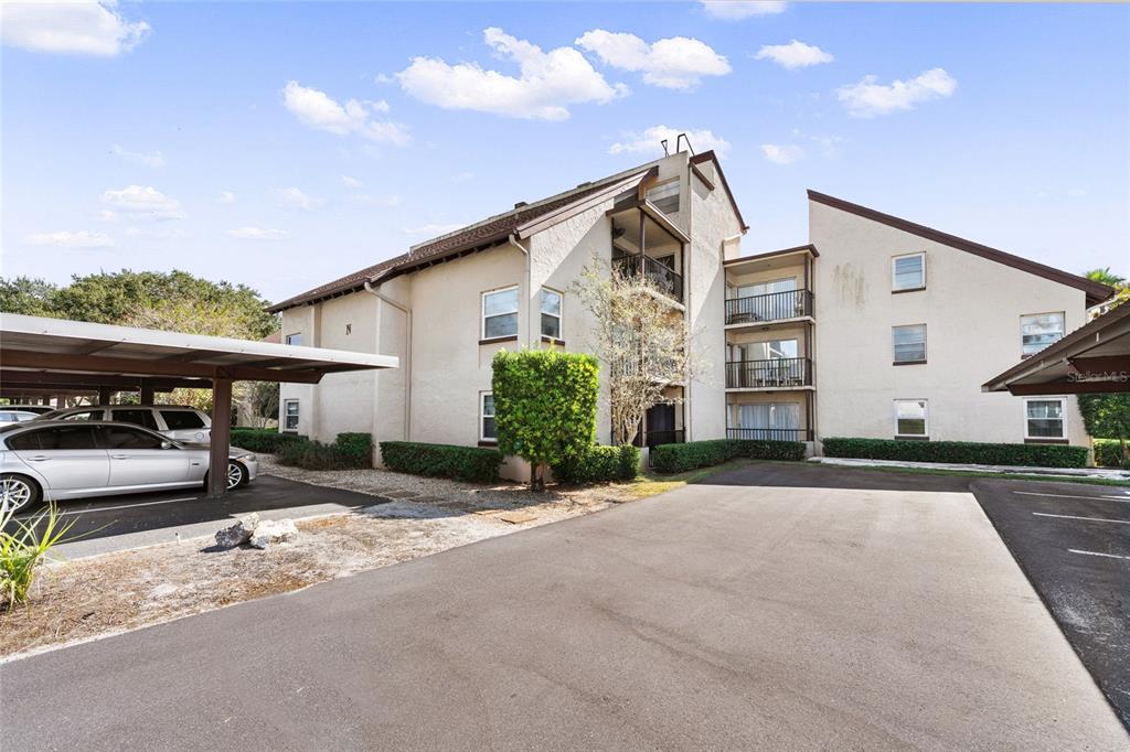 2025 Sylvester Road, Unit N312 Lakeland, FL 33803 - Photo 5 of 35 a view of a house with a patio