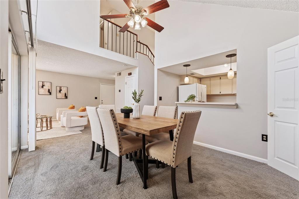 2025 Sylvester Road, Unit N312 Lakeland, FL 33803 - Photo 9 of 35 a view of a dining room with furniture