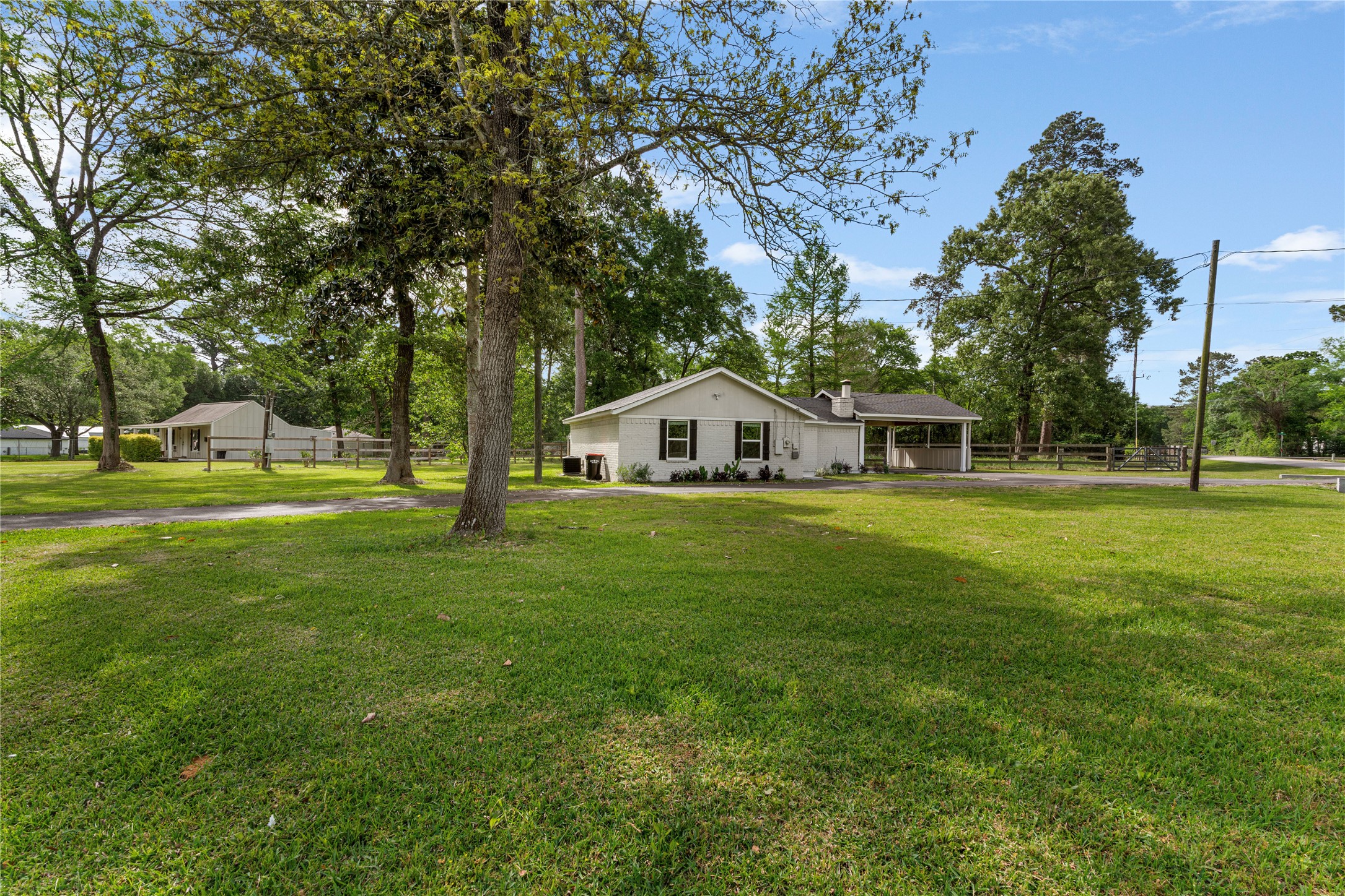 16027 Barbara Lane Magnolia, TX 77355 - Photo 1 of 40 a house view with a outdoor space