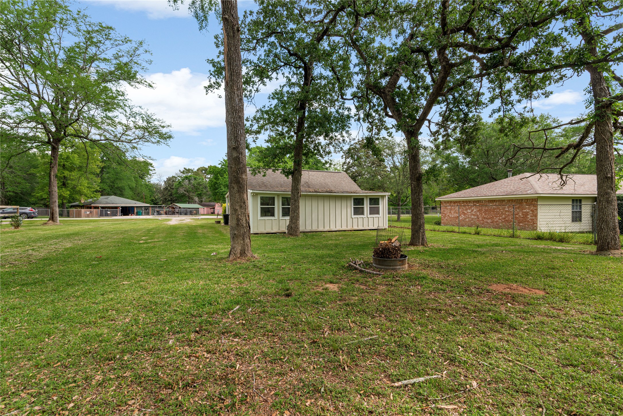16027 Barbara Lane Magnolia, TX 77355 - Photo 22 of 40 a house with garden in front of it