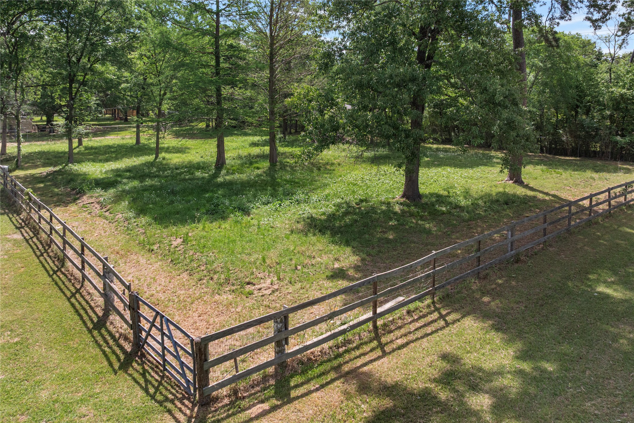 16027 Barbara Lane Magnolia, TX 77355 - Photo 40 of 40 a view of a backyard with wooden fence