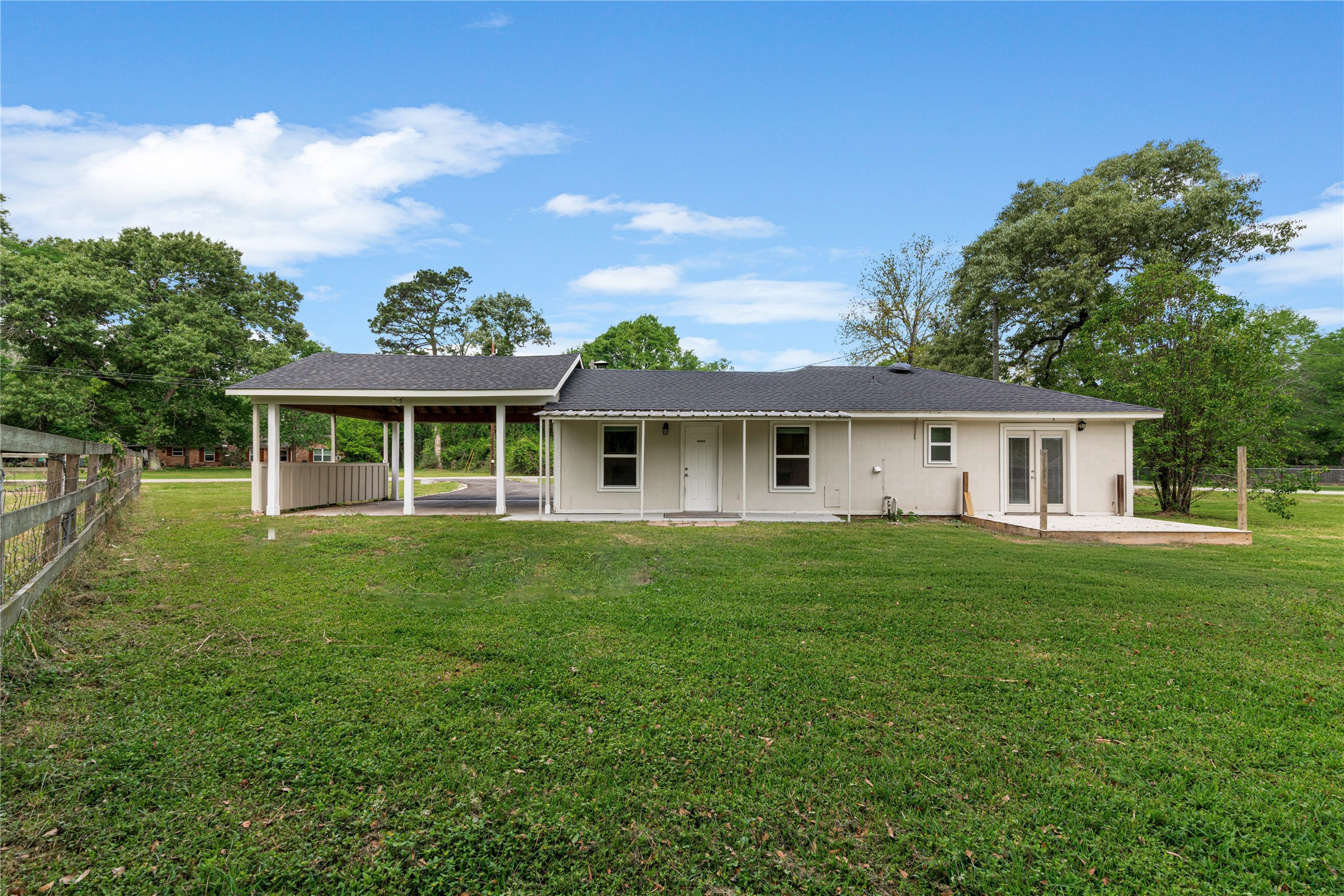16027 Barbara Lane Magnolia, TX 77355 - Photo 7 of 40 a front view of a house with a garden