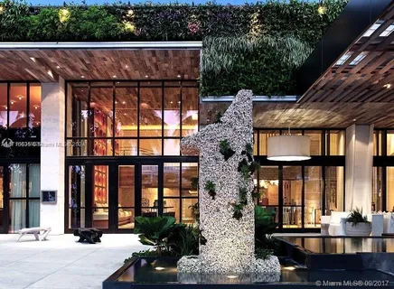 a front view of a house with a porch